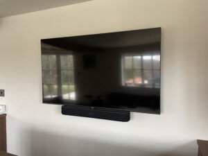 Wall mounted 50 inch TV and Sonos Beam soundbar